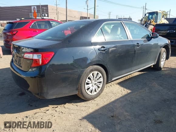 ✅ 2014 Toyota Camry XLE • VIN: 4T1BF1FK9EU461361 • Lot: 43409800. Listed on IAAI with 257,240 mi. Free auction sales archive from the USA and detailed vehicle history report at DreamBid. Image 4.