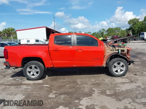 ✅ 2022 Chevrolet Colorado 2WD LT • VIN: 1GCGSCEN2N1101637 • Lot: 42559673. Listed on IAAI with 120,280 mi. Free auction sales archive from the USA and detailed vehicle history report at DreamBid. Image 14.