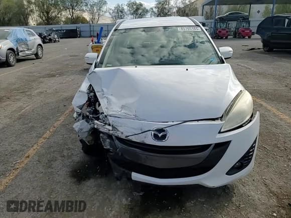 ✅ 2013 Mazda 5 Touring • VIN: JM1CW2CL2D0151635 • Лот: 85765165. Опубликован ранее на Copart с пробегом 194 381 миль. Бесплатный доступ к архиву аукционных продаж из США и подробный отчёт об истории автомобиля на DreamBid. Изображение 14.