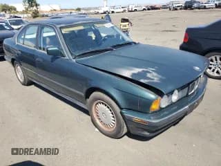 ✅ 1990 BMW 5 Series • VIN: WBAHC2311LBE30445 • Lot: 69346164. Listed on Copart with 211,899 mi. Free auction sales archive from the USA and detailed vehicle history report at DreamBid. Image 4.