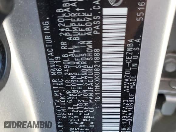 2019 Toyota Camry LE z VIN 4T1B11HKXKU821888, wystawiony jako Copart lot #86159375 z przebiegiem 64 469 mil mil oraz Szkoda całkowita • Salvage title. Historia ofert i sprzedaży dostępna na DreamBid. Obrazek 12.