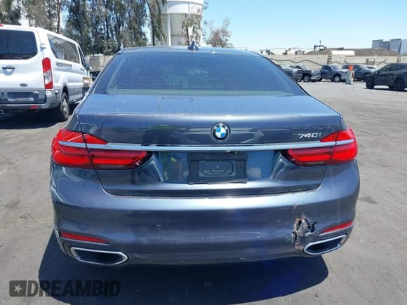✅ 2016 BMW 7 Series 740i • VIN: WBA7E2C51GG546677 • Лот: 42266694. Опубликован ранее на IAAI с пробегом 106 550 миль. Бесплатный доступ к архиву аукционных продаж из США и подробный отчёт об истории автомобиля на DreamBid. Изображение 16.
