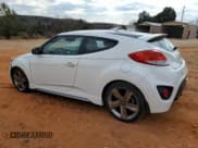 ✅ 2014 Hyundai Veloster Turbo • VIN: KMHTC6AE0EU210661 • Lot: 42590675. Wystawiony na Copart z przebiegiem 127 657 mil. Bezpłatny archiwum sprzedaży aukcyjnych z USA i szczegółowy raport historii pojazdu na DreamBid. Zdjęcie 2.