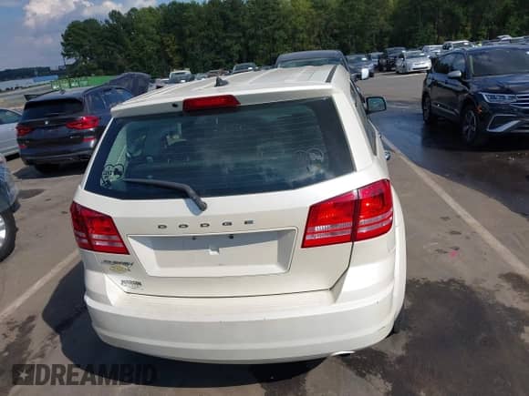 2013 Dodge Journey American Value с VIN 3C4PDCAB2DT584625, выставлен на аукционе IAAI как лот 43311985 с пробегом Не указан миль и . История ставок и продаж доступна на DreamBid. Изображение 17.