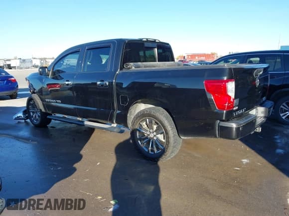 ✅ 2018 Nissan Titan Pro-4X • VIN: 1N6AA1E52JN511884 • Lot: 43594095. Listed on IAAI with 122,006 mi. Free auction sales archive from the USA and detailed vehicle history report at DreamBid. Image 3.