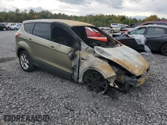 ✅ 2013 Ford Escape SEL • VIN: 1FMCU0HX7DUB59692 • Lot: 85194195. Listed on Copart with Not provided. Free auction sales archive from the USA and detailed vehicle history report at DreamBid. Image 4.