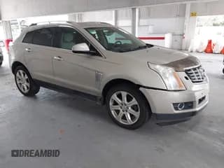✅ 2014 Cadillac SRX Performance Collection • VIN: 3GYFNCE33ES643534 • Lot: 42895333. Listed on IAAI with 90,716 mi. Free auction sales archive from the USA and detailed vehicle history report at DreamBid. Image 1.