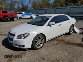 ✅ 2010 Chevrolet Malibu LTZ • VIN: 1G1ZE5E72AF147018 • Lot: 75877224. Listed on Copart with 112,616 mi. Free auction sales archive from the USA and detailed vehicle history report at DreamBid. Image 1.