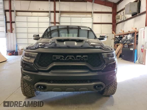 ✅ 2021 Ram 1500 TRX • VIN: 1C6SRFU90MN900150 • Lot: 82398365. Wystawiony na Copart z przebiegiem 43 714 mil. Bezpłatny archiwum sprzedaży aukcyjnych z USA i szczegółowy raport historii pojazdu na DreamBid. Zdjęcie 5.