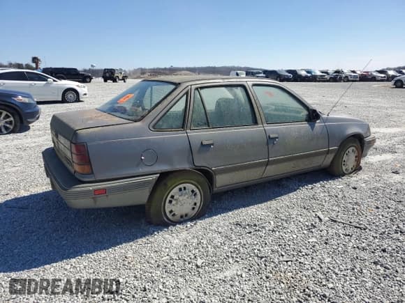✅ 1992 Pontiac Lemans • VIN: KL2TN5467NB324622 • Lot: 47321325. Wystawiony na Copart z przebiegiem 173 408 mil. Bezpłatny archiwum sprzedaży aukcyjnych z USA i szczegółowy raport historii pojazdu na DreamBid. Zdjęcie 3.