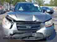 2009 Hyundai Santa Fe GLS z VIN 5NMSG13D09H274868, wystawiony jako IAAI lot #43265736 z przebiegiem 141 350 mil mil oraz . Historia ofert i sprzedaży dostępna na DreamBid. Obrazek 6.