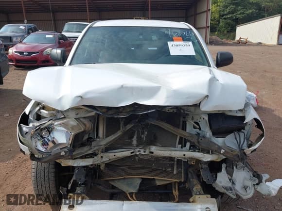 ✅ 2013 Toyota Tacoma • VIN: 5TFNX4CNXDX029485 • Lot: 43059359. Listed on IAAI with 241,403 mi. Free auction sales archive from the USA and detailed vehicle history report at DreamBid. Image 6.