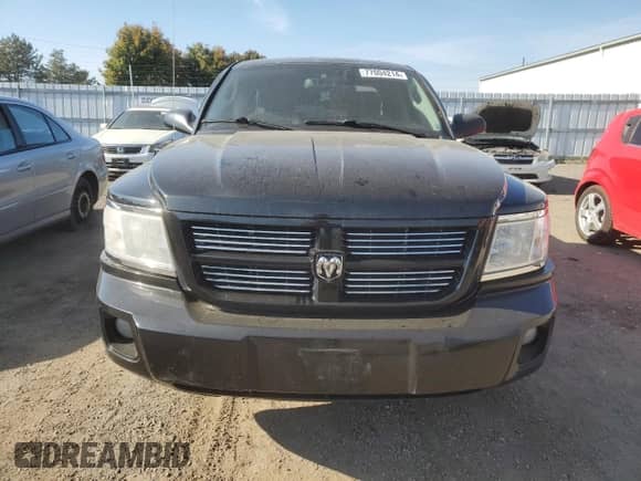 2010 Dodge Dakota Bighorn/Lonestar with VIN 1D7CW3GK3AS264409, listed as a Copart auction lot 77004214 with 214,089 mi miles and Clean title. Bid and sale history available at DreamBid. Image 5.