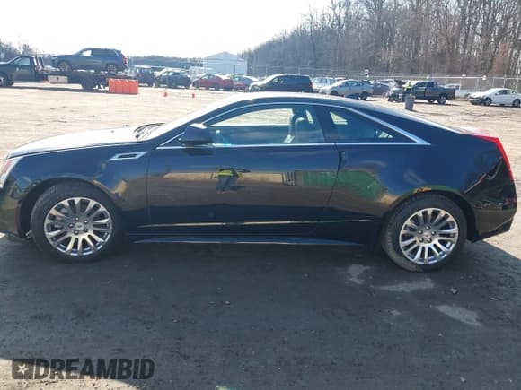 ✅ 2014 Cadillac CTS Premium • VIN: 1G6DH1E32E0177775 • Lot: 41540366. Listed on IAAI with 106,398 mi. Free auction sales archive from the USA and detailed vehicle history report at DreamBid. Image 14.