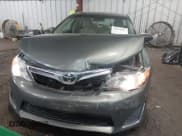 ✅ 2014 Toyota Camry LE • VIN: 4T4BF1FKXER390239 • Lot: 43062805. Listed on IAAI with 123,686 mi. Free auction sales archive from the USA and detailed vehicle history report at DreamBid. Image 6.