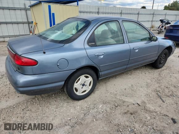 ✅ 1999 Ford Contour LX • VIN: 1FAFP6535XK235090 • Lot: 84621665. Wystawiony na Copart z przebiegiem 125 216 mil. Bezpłatny archiwum sprzedaży aukcyjnych z USA i szczegółowy raport historii pojazdu na DreamBid. Zdjęcie 3.