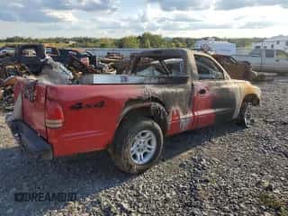 2003 Dodge Dakota z VIN 1D7GG16X23S267062, wystawiony jako Copart lot #71924784 z przebiegiem Nie podano mil oraz Szkoda całkowita • Salvage title. Historia ofert i sprzedaży dostępna na DreamBid. Obrazek 3.