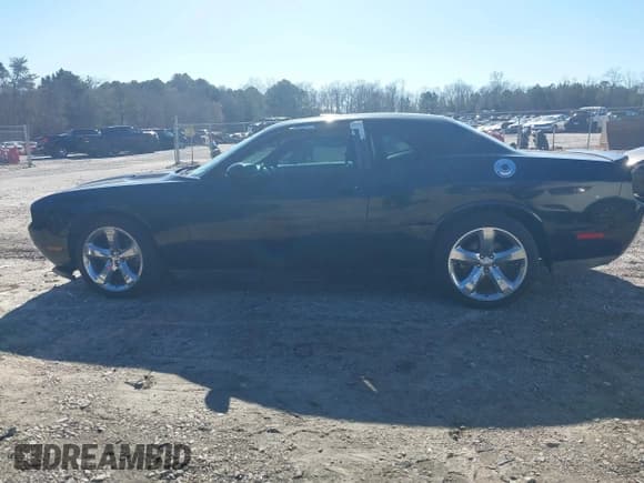 ✅ 2014 Dodge Challenger SXT • VIN: 2C3CDYAG1EH229824 • Lot: 41749410. Listed on IAAI with 103,079 mi. Free auction sales archive from the USA and detailed vehicle history report at DreamBid. Image 14.