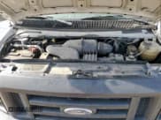 ✅ 2012 Ford Econoline Cargo Recreational • VIN: 1FTNE2EW5CDB26044 • Lot: 61086745. Wystawiony na Copart z przebiegiem 285 091 mil. Bezpłatny archiwum sprzedaży aukcyjnych z USA i szczegółowy raport historii pojazdu na DreamBid. Zdjęcie 11.