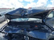 ✅ 2025 Mazda CX-50 Hybrid Premium Plus Package • VIN: 7MMVAAEW9SN127423 • Lot: 43322908. Wystawiony na IAAI z przebiegiem 2 928 mil. Bezpłatny archiwum sprzedaży aukcyjnych z USA i szczegółowy raport historii pojazdu na DreamBid. Zdjęcie 10.