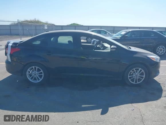 ✅ 2017 Ford Focus SE • VIN: 1FADP3F28HL216766 • Lot: 42248523. Wystawiony na IAAI z przebiegiem 134 622 mil. Bezpłatny archiwum sprzedaży aukcyjnych z USA i szczegółowy raport historii pojazdu na DreamBid. Zdjęcie 13.