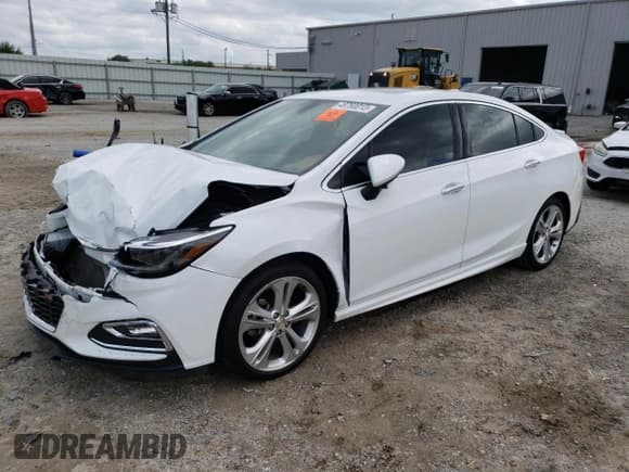 ✅ 2017 Chevrolet Cruze Premier • VIN: 1G1BF5SMXH7196917 • Lot: 46760013. Listed on Copart with 69,089 mi. Free auction sales archive from the USA and detailed vehicle history report at DreamBid. Image 1.