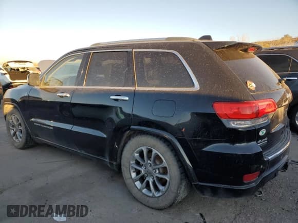✅ 2015 Jeep Grand Cherokee Overland • VIN: 1C4RJFCMXFC618455 • Lot: 80548554. Listed on Copart with 175,413 mi. Free auction sales archive from the USA and detailed vehicle history report at DreamBid. Image 2.
