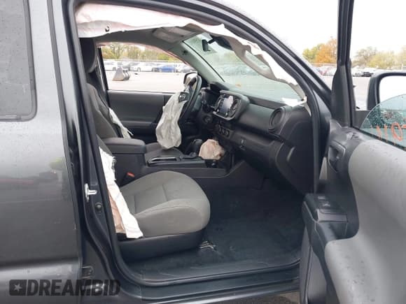 ✅ 2023 Toyota Tacoma TRD Off Road • VIN: 3TMCZ5AN5PM571369 • Lot: 43559181. Listed on IAAI with 56,795 mi. Free auction sales archive from the USA and detailed vehicle history report at DreamBid. Image 5.