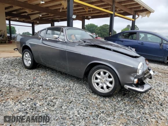 ✅ 1968 Volvo P1800 • VIN: 18345102704S00000 • Лот: 55470025. Опубликован ранее на Copart с пробегом 68 692 миль. Бесплатный доступ к архиву аукционных продаж из США и подробный отчёт об истории автомобиля на DreamBid. Изображение 4.