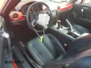 ✅ 2006 Mazda MX-5 Miata Touring • VIN: JM1NC25F760102166 • Lot: 44651545. Wystawiony na Copart z przebiegiem 105 737 mil. Bezpłatny archiwum sprzedaży aukcyjnych z USA i szczegółowy raport historii pojazdu na DreamBid. Zdjęcie 8.