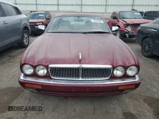 ✅ 1997 Jaguar XJ Vanden Plas • VIN: SAJKX6243VC804338 • Лот: 43286945. Опубликован ранее на Copart с пробегом 124 274 миль. Бесплатный доступ к архиву аукционных продаж из США и подробный отчёт об истории автомобиля на DreamBid. Изображение 5.