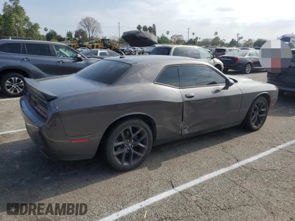 ✅ 2021 Dodge Challenger SXT • VIN: 2C3CDZAG6MH599882 • Lot: 49601674. Wystawiony na Copart z przebiegiem 61 214 mil. Bezpłatny archiwum sprzedaży aukcyjnych z USA i szczegółowy raport historii pojazdu na DreamBid. Zdjęcie 3.