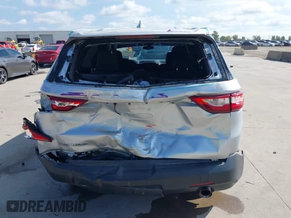 ✅ 2020 Chevrolet Traverse LS • VIN: 1GNERFKW1LJ250465 • Lot: 43244251. Listed on IAAI with 124,464 mi. Free auction sales archive from the USA and detailed vehicle history report at DreamBid. Image 17.