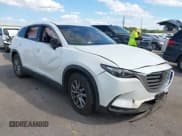 ✅ 2018 Mazda CX-9 Touring • VIN: JM3TCACY0J0218797 • Lot: 43283366. Wystawiony na IAAI z przebiegiem 128 413 mil. Bezpłatny archiwum sprzedaży aukcyjnych z USA i szczegółowy raport historii pojazdu na DreamBid. Zdjęcie 1.