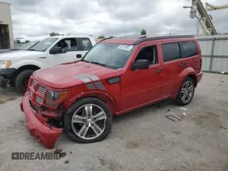 2011 Dodge Nitro Shock z VIN 1D4PT7GX7BW576298, wystawiony jako Copart lot #62912865 z przebiegiem 125 517 mil mil oraz Szkoda całkowita • Salvage title. Historia ofert i sprzedaży dostępna na DreamBid. Obrazek 1.