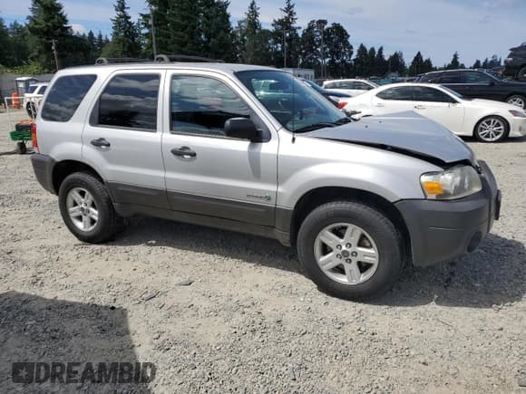 ✅ 2006 Ford Escape Hybrid • VIN: 1FMYU96H56KA48353 • Lot: 63620365. Listed on Copart with 165,223 mi. Free auction sales archive from the USA and detailed vehicle history report at DreamBid. Image 4.