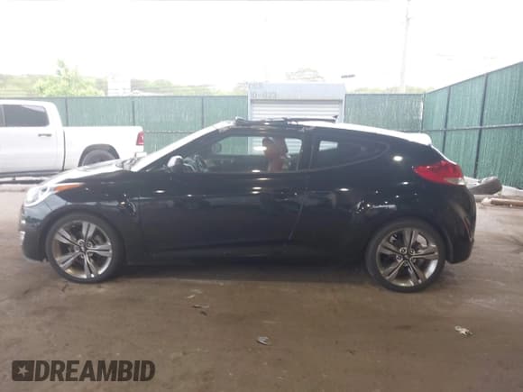 ✅ 2012 Hyundai Veloster w/Gray Int • VIN: KMHTC6AD8CU023947 • Lot: 42314126. Listed on IAAI with 57,630 mi. Free auction sales archive from the USA and detailed vehicle history report at DreamBid. Image 14.