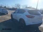 ✅ 2016 Mazda CX-5 Grand Touring • VIN: JM3KE4DY6G0864294 • Lot: 43639964. Wystawiony na IAAI z przebiegiem 119 285 mil. Bezpłatny archiwum sprzedaży aukcyjnych z USA i szczegółowy raport historii pojazdu na DreamBid. Zdjęcie 3.