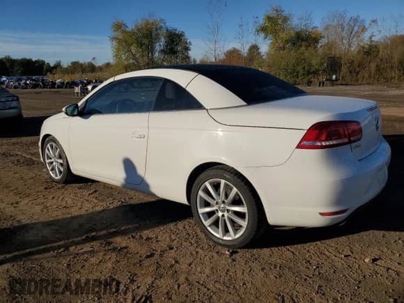 ✅ 2014 Volkswagen Eos Komfort • VIN: WVWBW8AH2EV000733 • Лот: 82770925. Опубликован ранее на Copart с пробегом 139 754 миль. Бесплатный доступ к архиву аукционных продаж из США и подробный отчёт об истории автомобиля на DreamBid. Изображение 2.