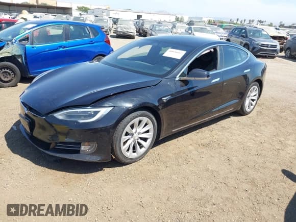 ✅ 2016 Tesla Model S 90D • VIN: 5YJSA1E21GF177111 • Lot: 40026667. Listed on IAAI with 92,097 mi. Free auction sales archive from the USA and detailed vehicle history report at DreamBid. Image 18.