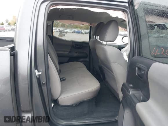 ✅ 2023 Toyota Tacoma TRD Off Road • VIN: 3TMCZ5AN5PM571369 • Lot: 43559181. Listed on IAAI with 56,795 mi. Free auction sales archive from the USA and detailed vehicle history report at DreamBid. Image 8.