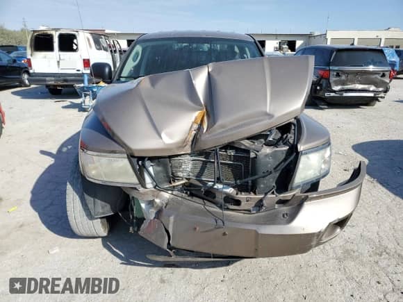 2010 Dodge Dakota Laramie z VIN 1D7RW5GP7AS203338, wystawiony jako Copart lot #74550574 z przebiegiem 94 732 mil mil oraz Szkoda całkowita • Salvage title. Historia ofert i sprzedaży dostępna na DreamBid. Obrazek 5.