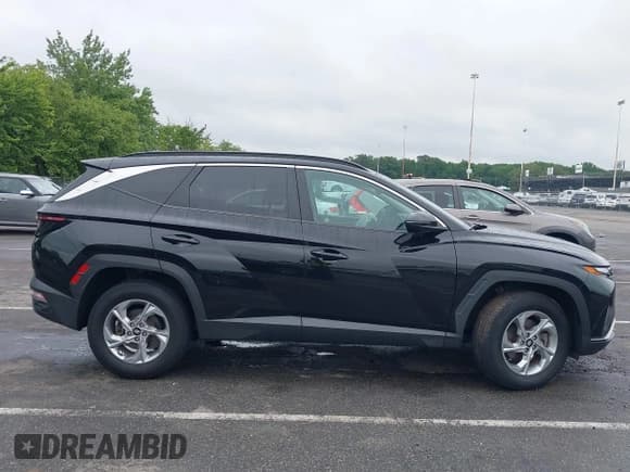 ✅ 2022 Hyundai Tucson SEL • VIN: KM8JBCAE6NU031615 • Lot: 42887395. Listed on IAAI with 63,078 mi. Free auction sales archive from the USA and detailed vehicle history report at DreamBid. Image 13.