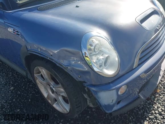 ✅ 2005 MINI Convertible S • VIN: WMWRH33455TF82408 • Lot: 41857791. Listed on IAAI with 133,824 mi. Free auction sales archive from the USA and detailed vehicle history report at DreamBid. Image 6.