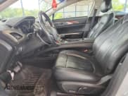 ✅ 2015 Lincoln MKZ • VIN: 3LN6L2JK8FR616546 • Lot: 68147855. Listed on Copart with 115,392 mi. Free auction sales archive from the USA and detailed vehicle history report at DreamBid. Image 7.