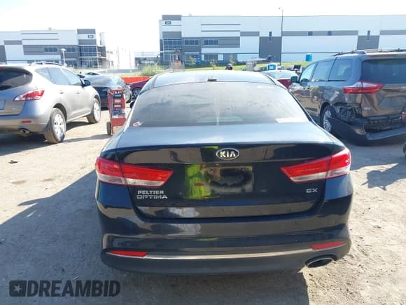 ✅ 2016 Kia Optima EX • VIN: 5XXGU4L31GG078988 • Lot: 43427738. Listed on IAAI with 97,321 mi. Free auction sales archive from the USA and detailed vehicle history report at DreamBid. Image 16.
