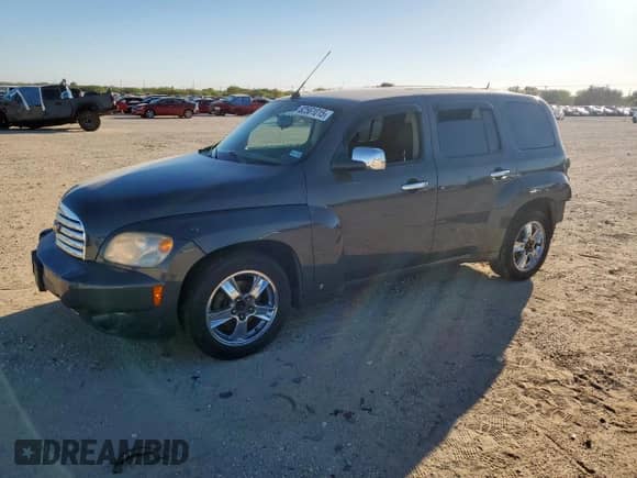 2009 Chevrolet HHR 1LT with VIN 3GNCA23V39S601297, listed as a Copart auction lot 82561015 with 114,705 mi miles and Salvage title. Bid and sale history available at DreamBid. Image 1.