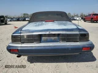 ✅ 1995 Jaguar XJS • VIN: SAJNX2748SC221676 • Лот: 49185945. Опубликован ранее на Copart с пробегом 160 087 миль. Бесплатный доступ к архиву аукционных продаж из США и подробный отчёт об истории автомобиля на DreamBid. Изображение 6.