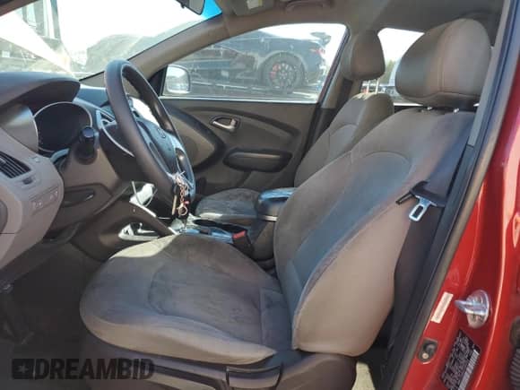 2012 Hyundai Tucson GL z VIN KM8JT3ABXCU340701, wystawiony jako Copart lot #85144885 z przebiegiem 147 376 mil mil oraz Szkoda całkowita • Salvage title. Historia ofert i sprzedaży dostępna na DreamBid. Obrazek 7.