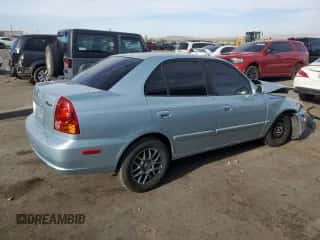 2005 Hyundai Accent GLS с VIN KMHCG45C35U640248, выставлен на аукционе Copart как лот 57684835 с пробегом 158 108 миль миль и Списание • Salvage title. История ставок и продаж доступна на DreamBid. Изображение 3.
